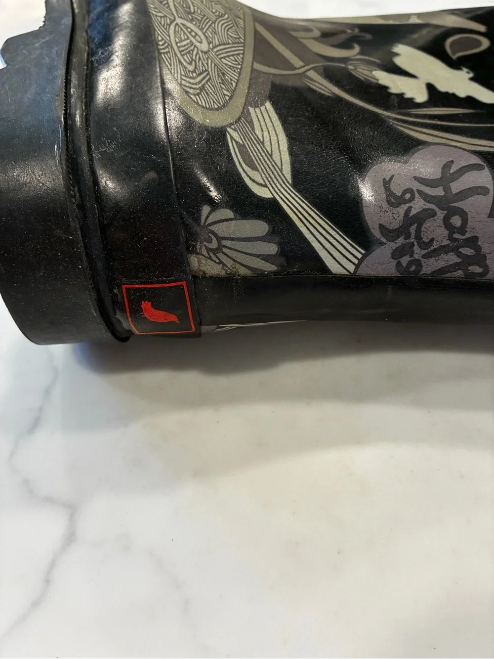 The Sak Nature Floral Black Rain Boots